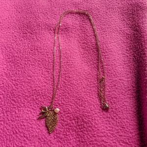 long gold-plated bird necklace